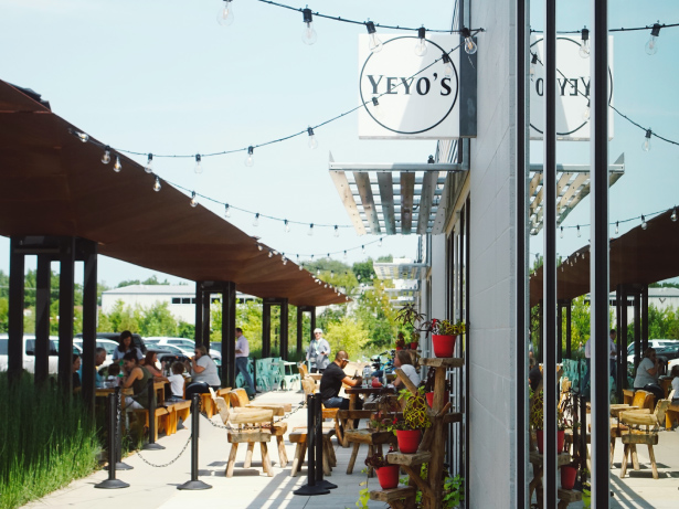 Eight Street Market with a sign to YEYO'S